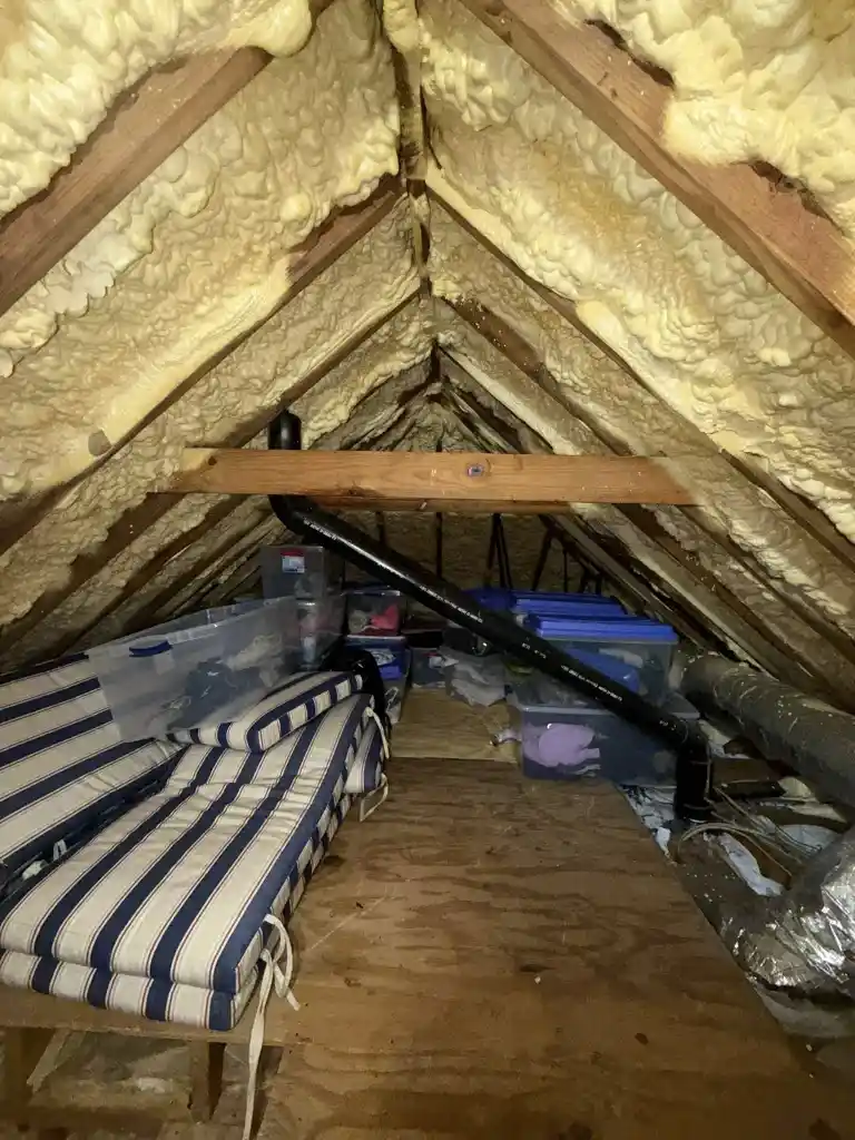 After attic mold removal: spray foam insulated roof deck with storage in Gainesville FL